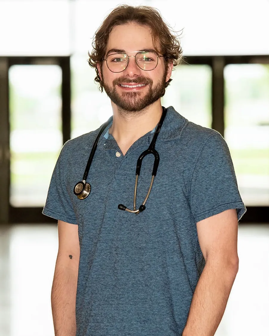 Dr. Hayden Henslee with a patient